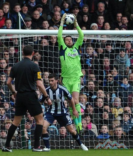 West Brom's goalkeeper Ben Foster makes a save during their match against West Ham, at Upton Park, on March 30, 2013